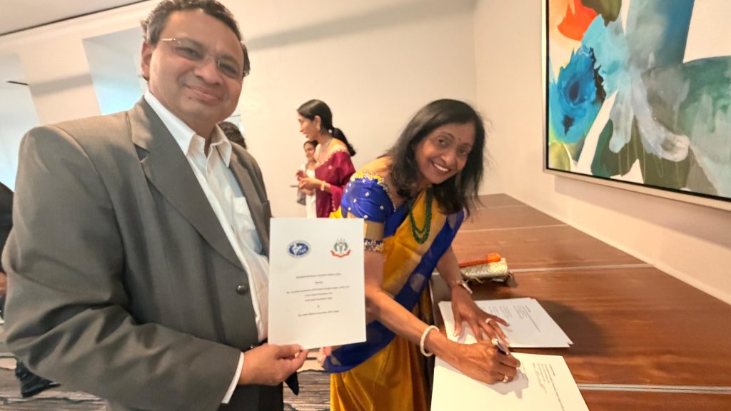 Meher signing the MoU